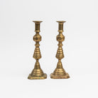 Vintage Brass Geometric Candlesticks on a white background at Addison West