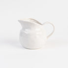 Stoneware Vintage Pitcher on a white background at Addison West