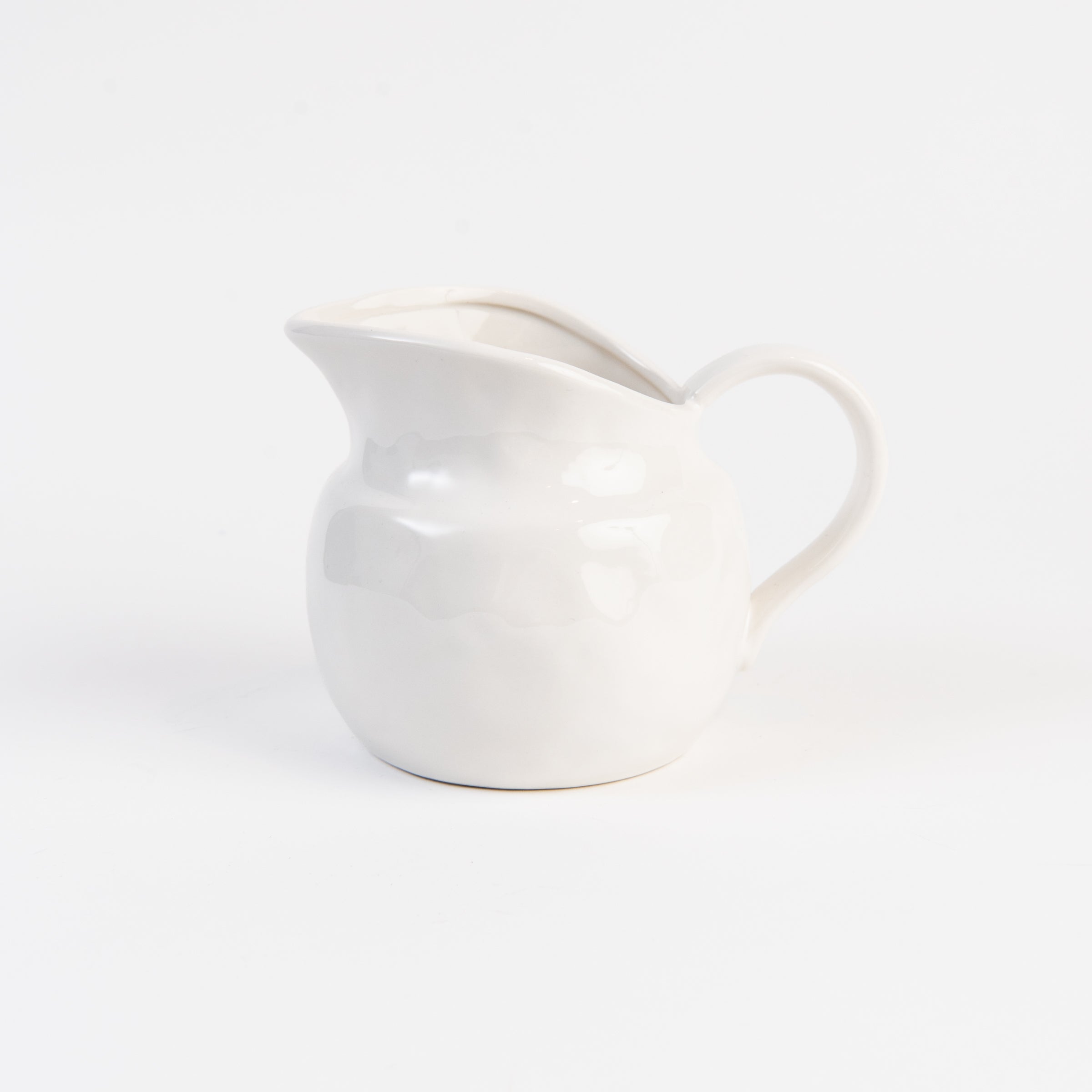 Stoneware Vintage Pitcher on a white background at Addison West