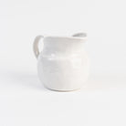 Stoneware Vintage Pitcher on a white background at Addison West