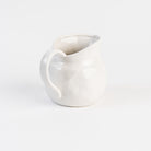 Stoneware Vintage Pitcher on a white background at Addison West