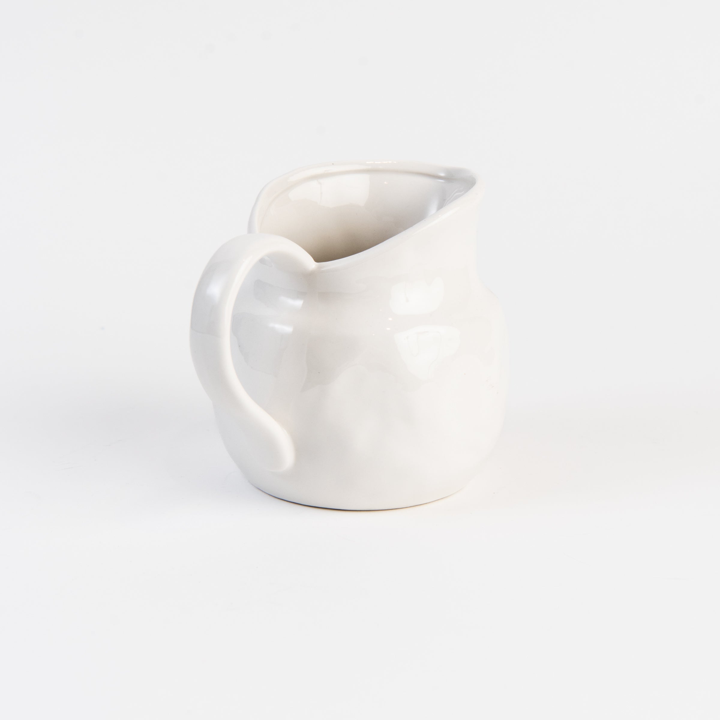 Stoneware Vintage Pitcher on a white background at Addison West