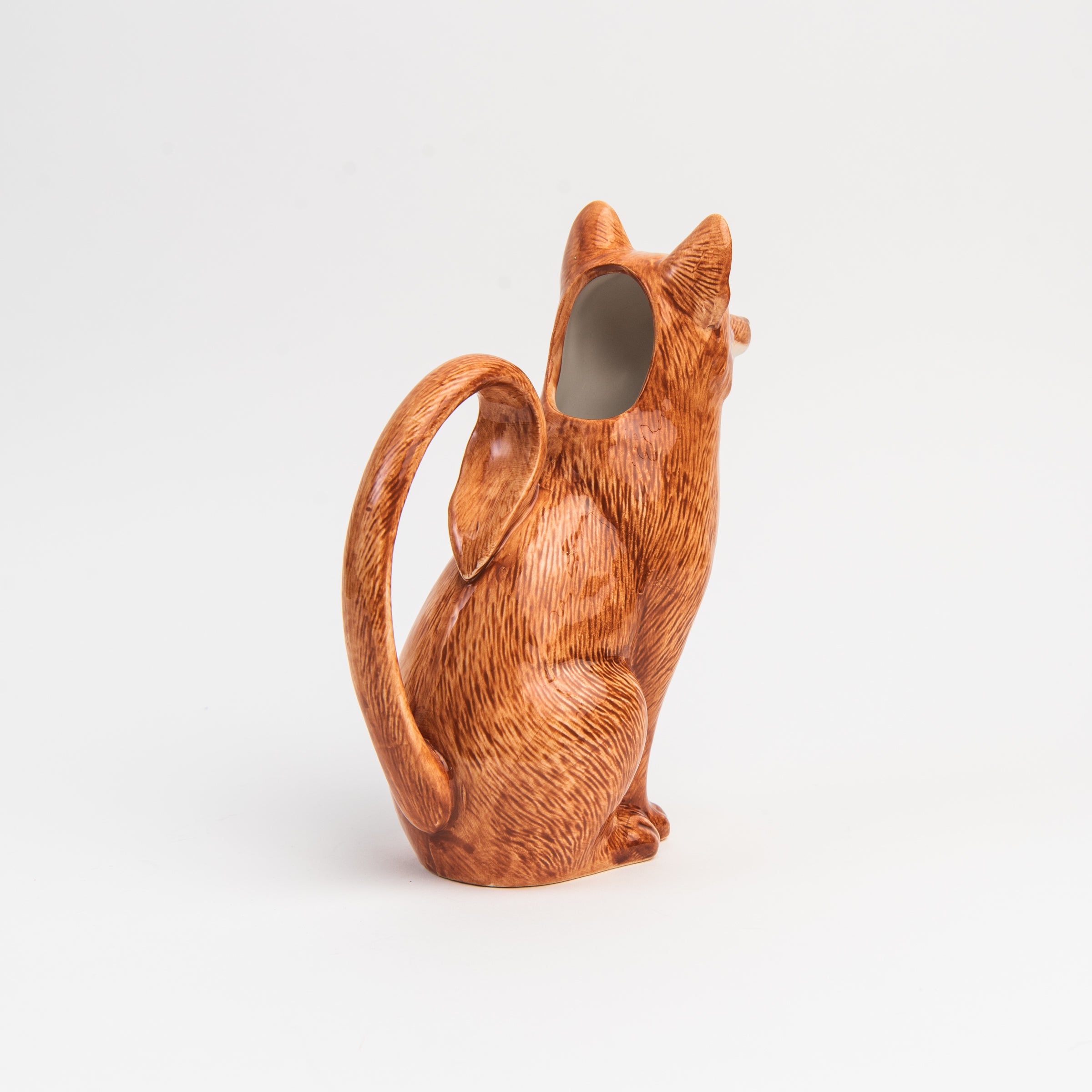 Red Fox Pitcher on a white background at Addison West