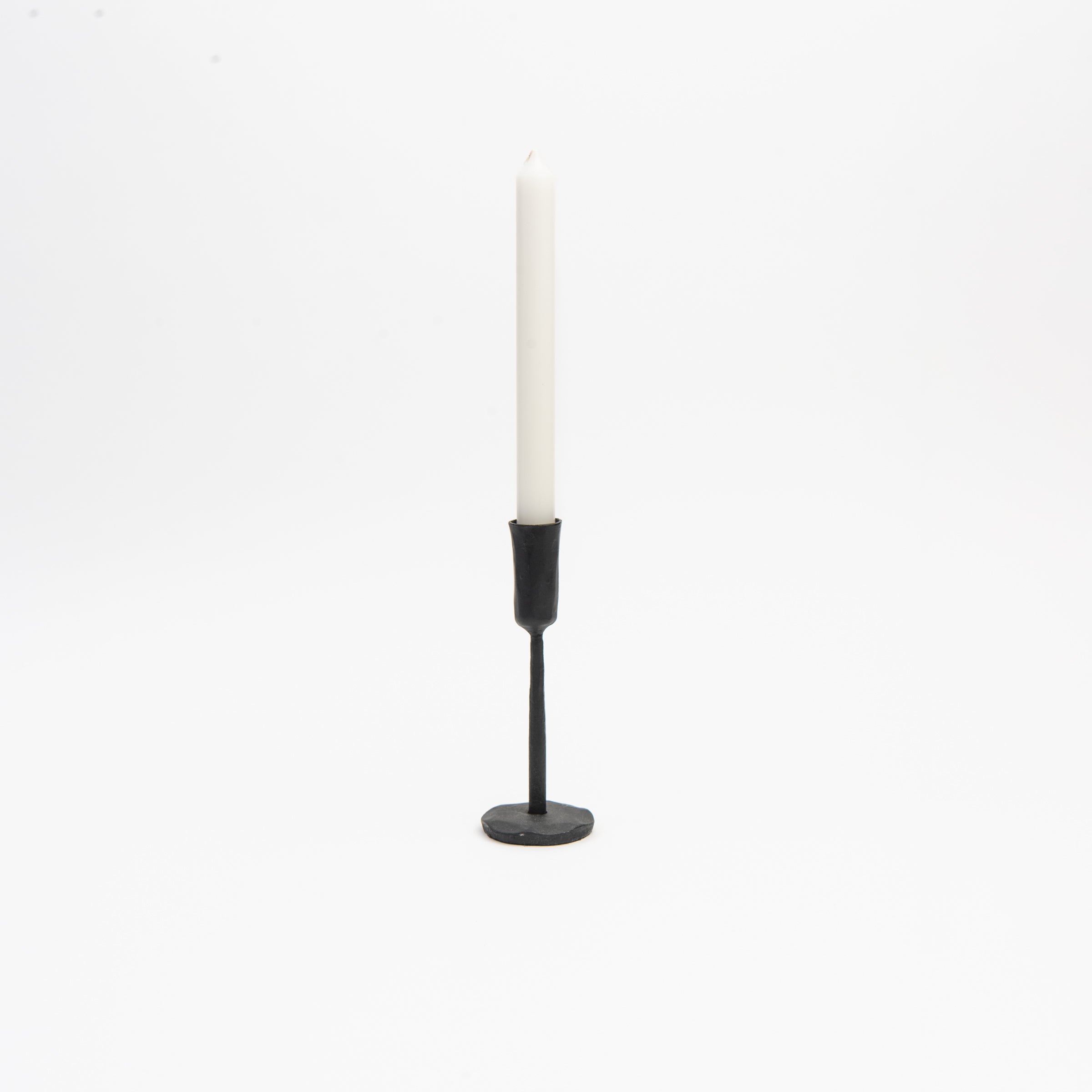 Legacy Forged Candlestick on a white background at Addison West