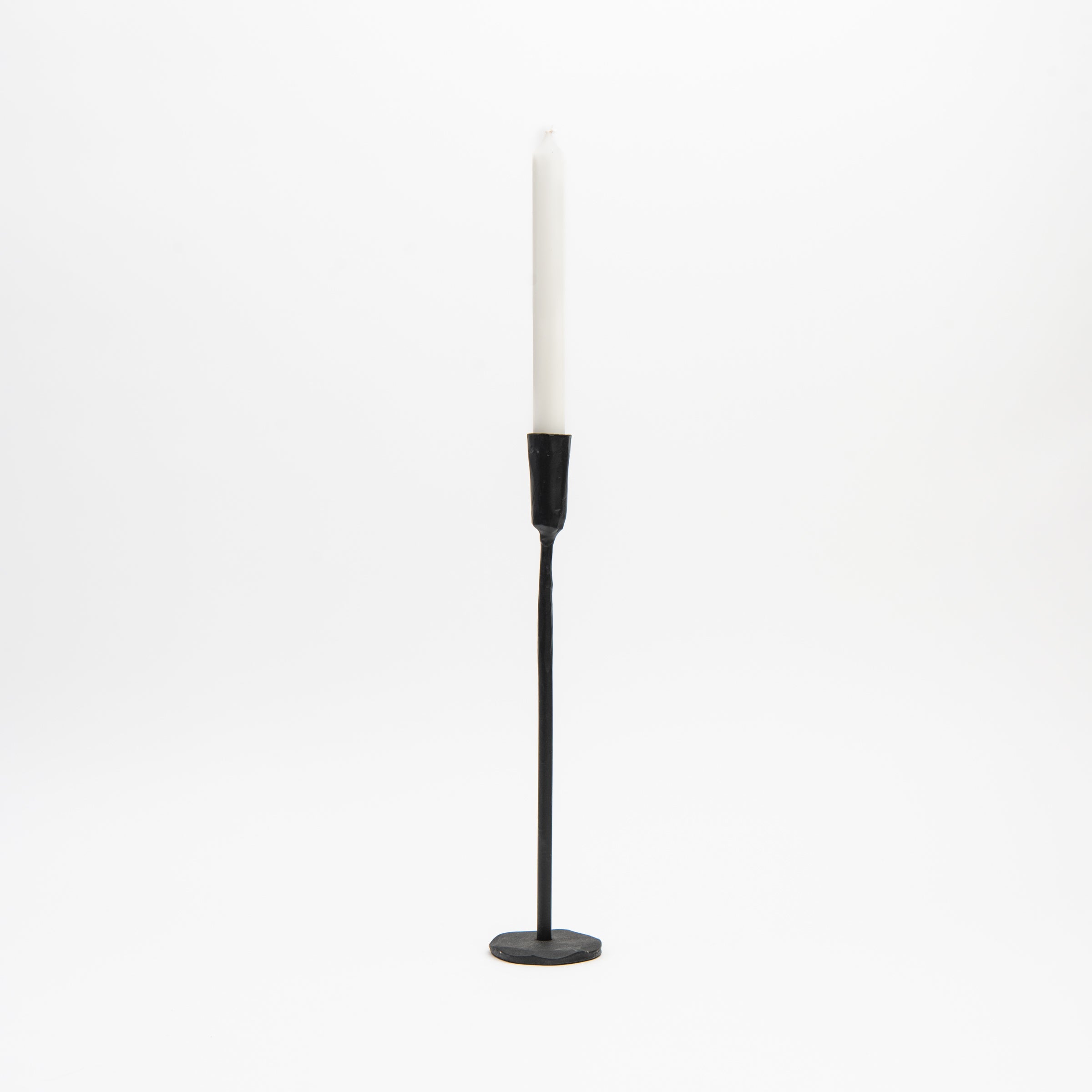 Legacy Forged Candlestick on a white background at Addison West