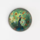 Peacock Paperweight on a white background at Addison West