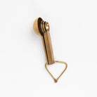 Cultivar Measuring Spoons in Tumbled Gold on a white background at Addison West