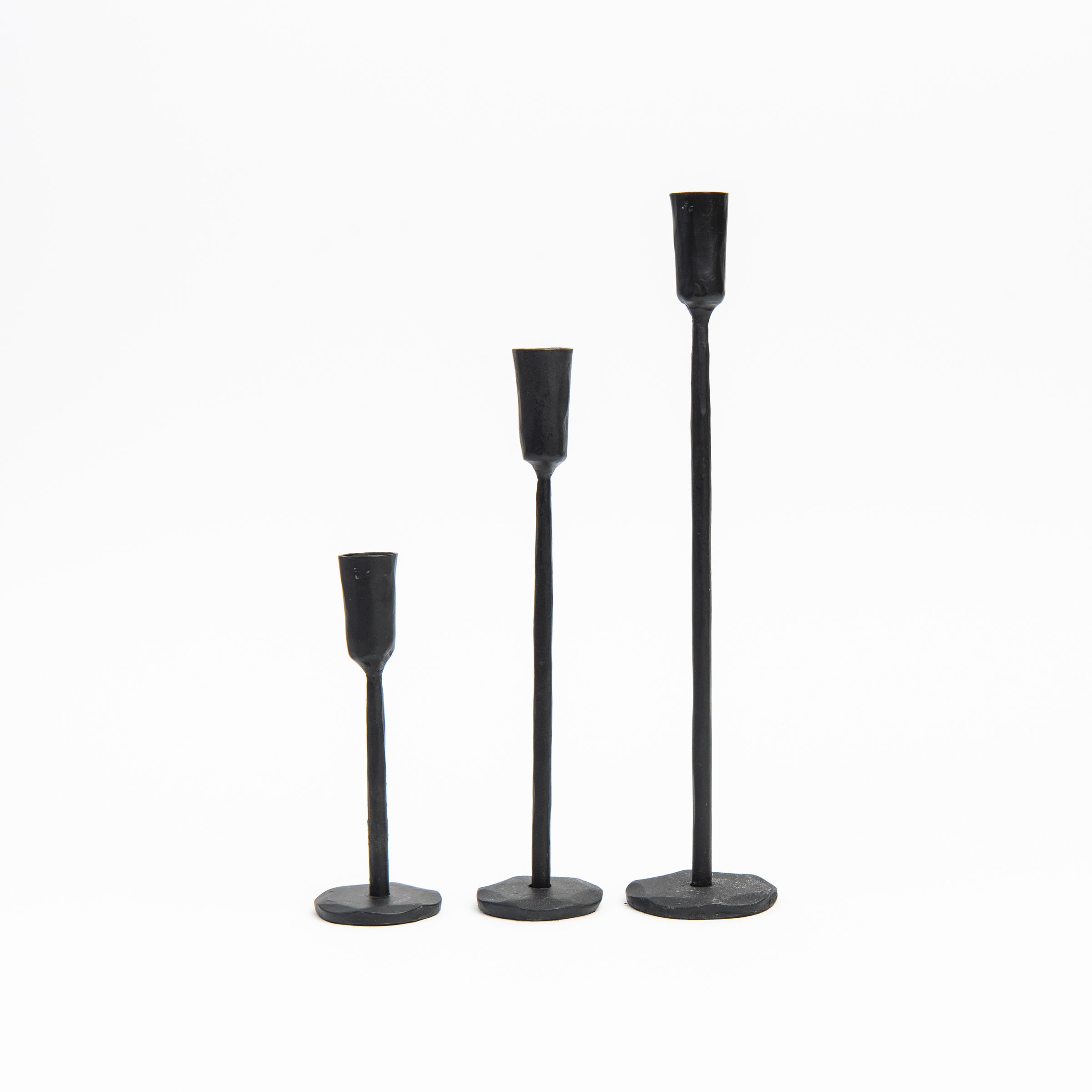 Legacy Forged Candlestick on a white background at Addison West