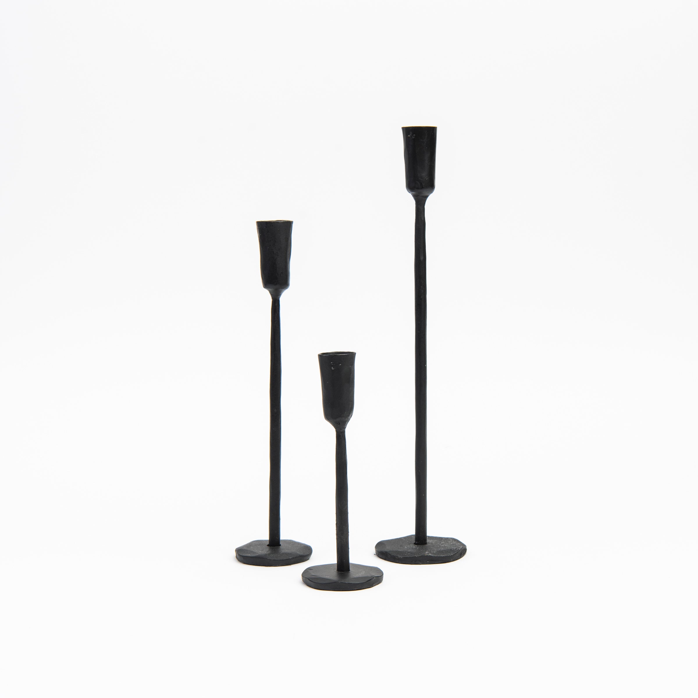 Legacy Forged Candlestick on a white background at Addison West