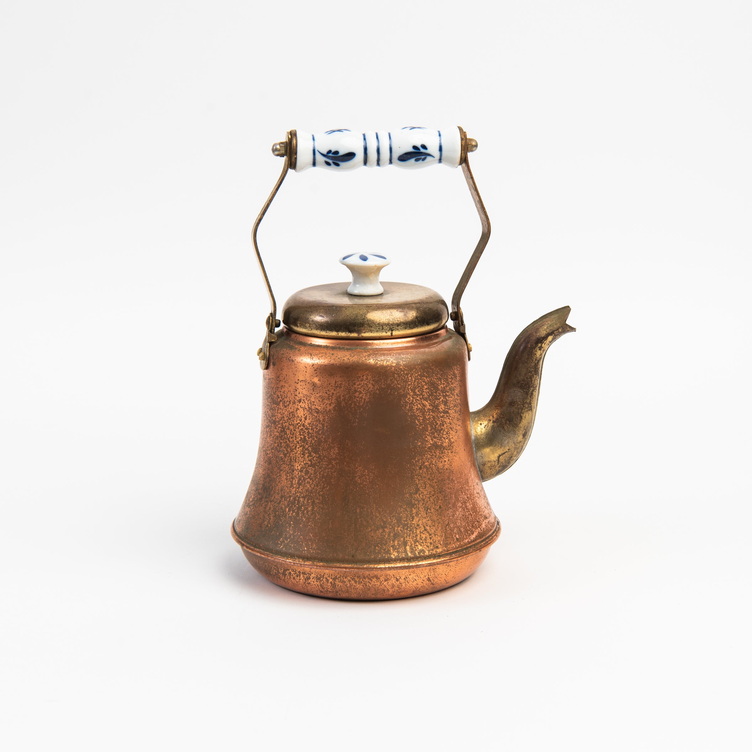 Vintage Copper Tea Pot with Delftware on a white background at Addison West