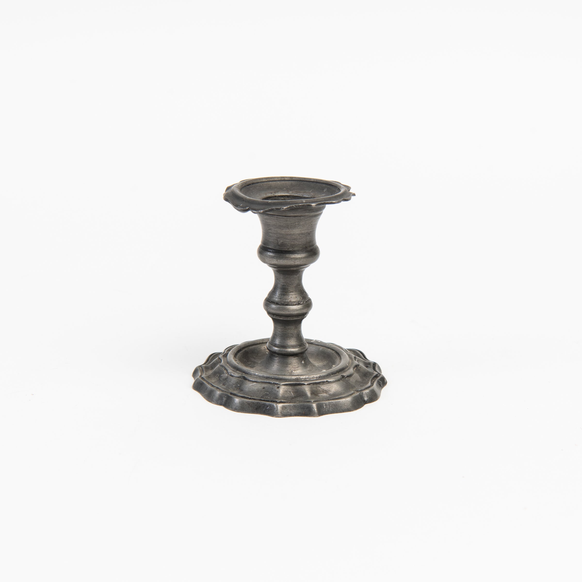 Vintage Short Pewter Candlestick on a white background at Addison West