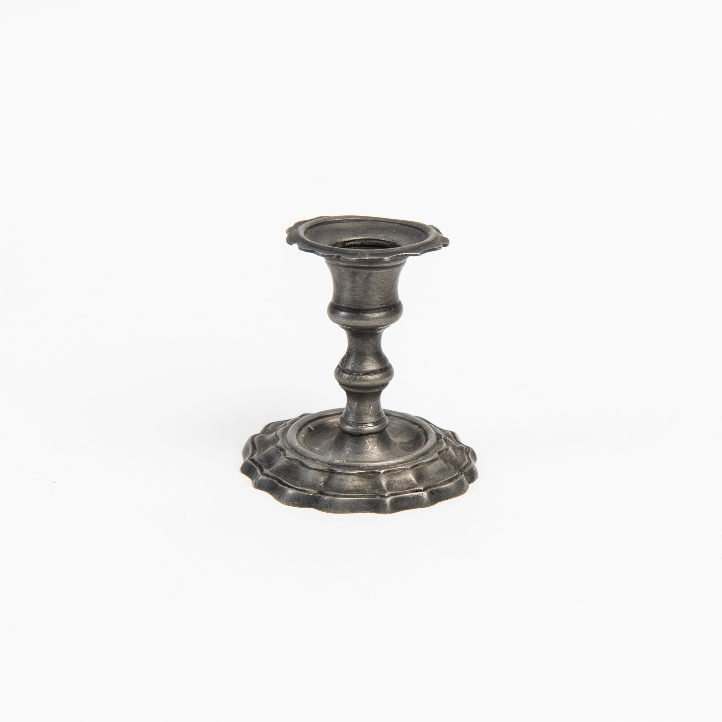 Vintage Short Pewter Candlestick on a white background at Addison West
