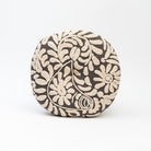 Wildflower Round Pillow in Charcoal on a white background at Addison West 