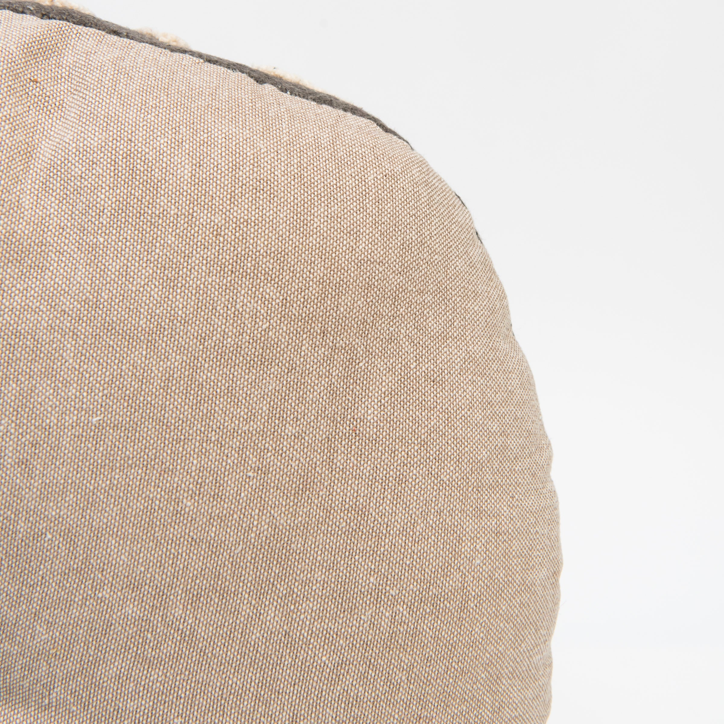 Close up of Wildflower Round Pillow in Charcoal on a white background at Addison West 