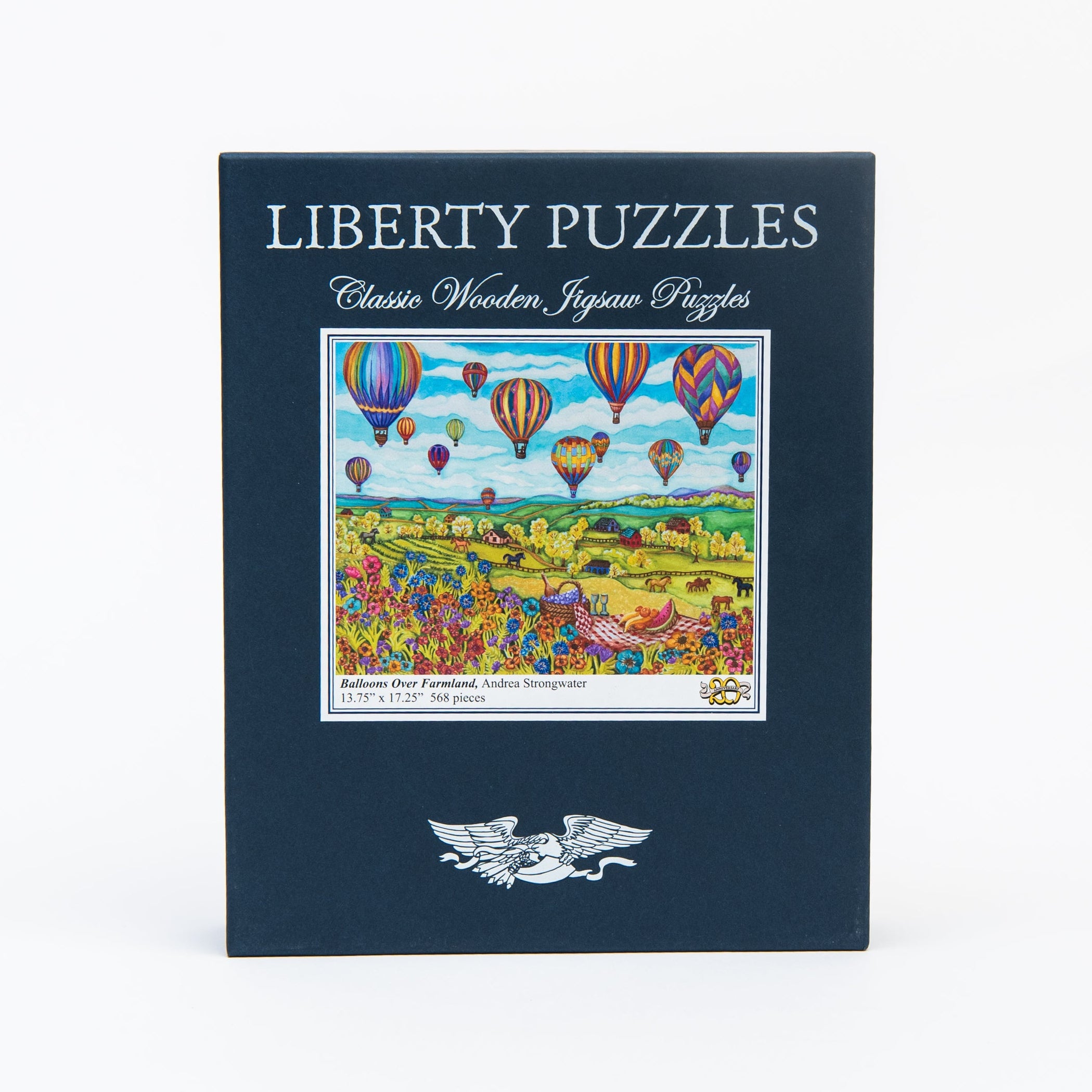 Liberty Puzzle Balloons Over Farmland on a white background at Addison West