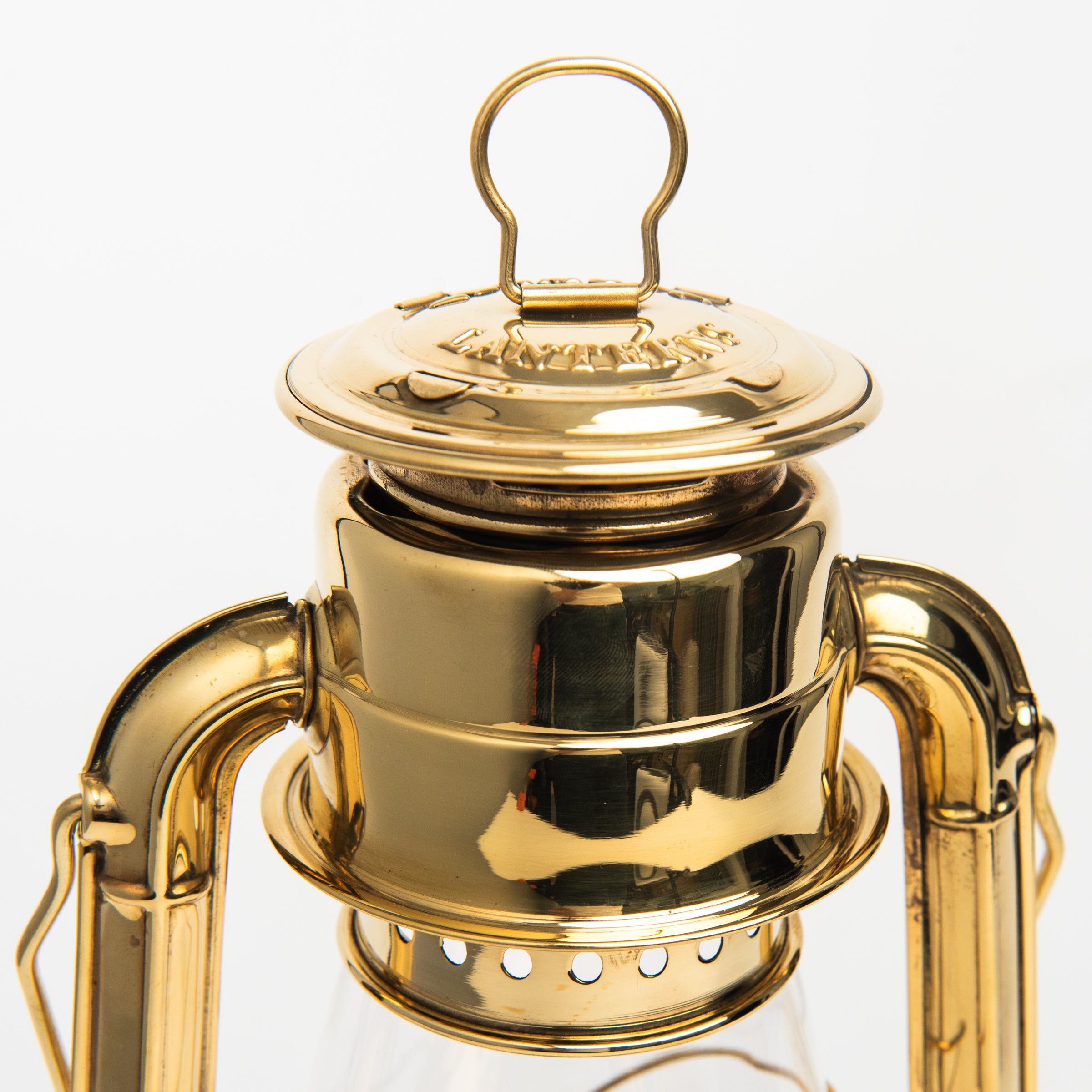 Close up of Vermont Lantern in Brass on a white background at Addison West