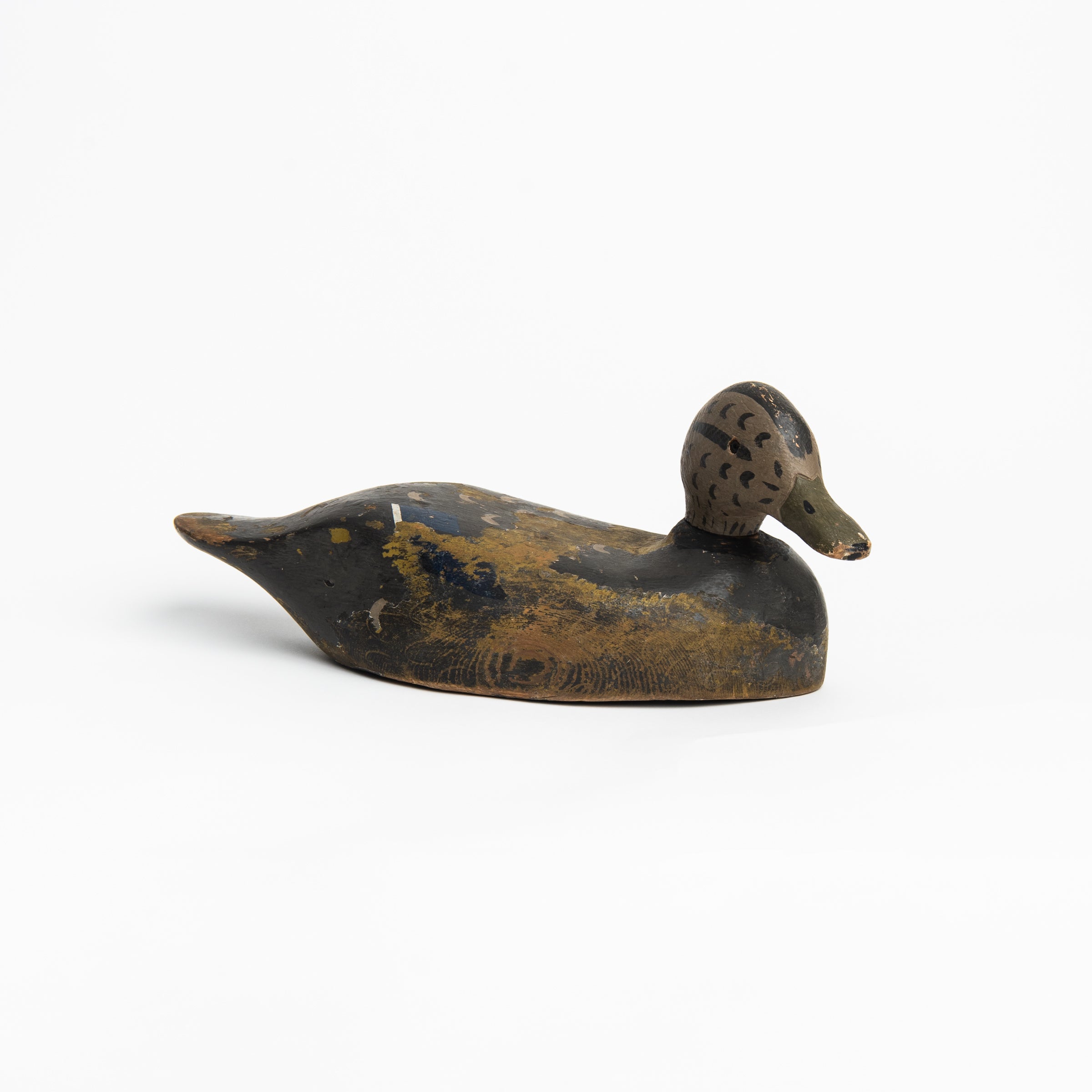 Vintage Wood Decoy on a white background at Addison West