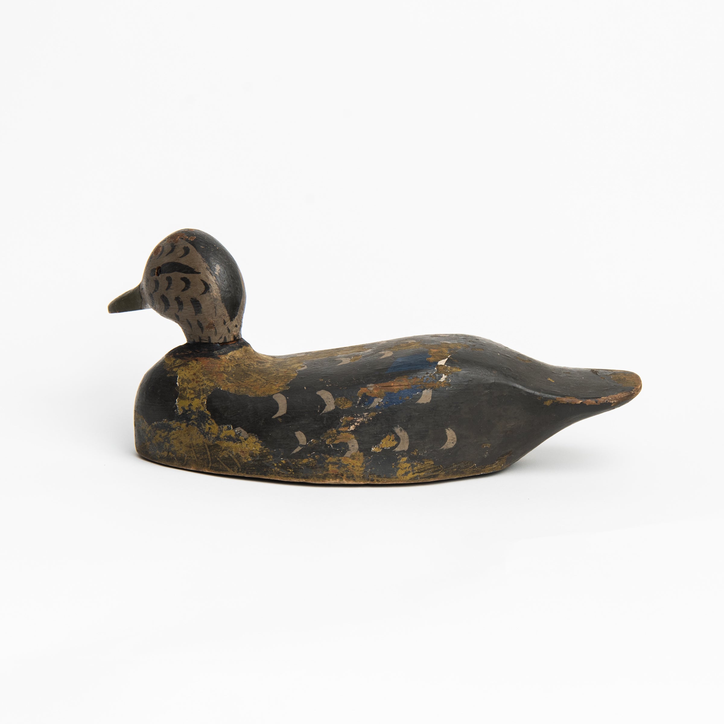 Vintage Wood Decoy on a white background at Addison West