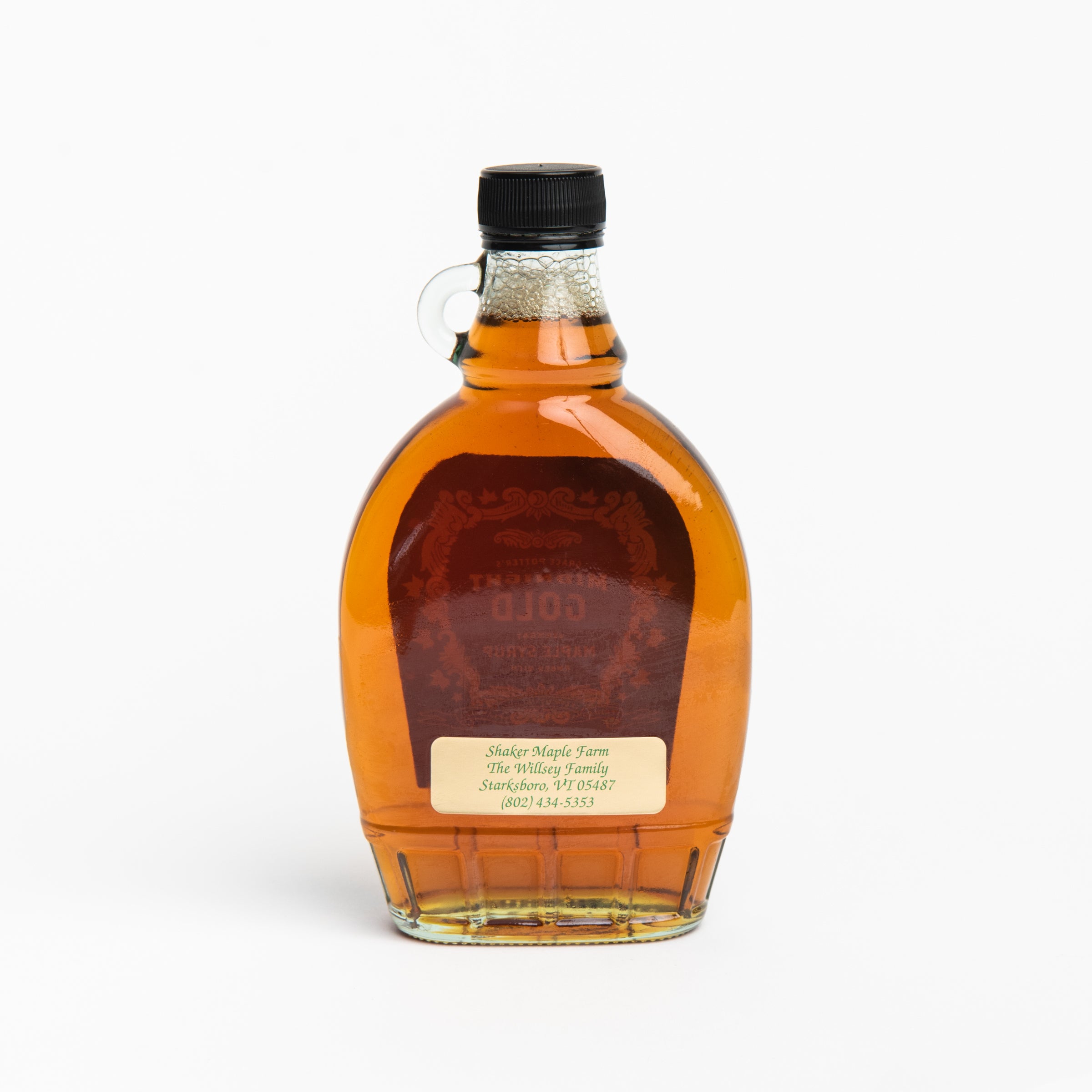 Grace Potter's Midnight Gold Maple Syrup on a white background at Addison West