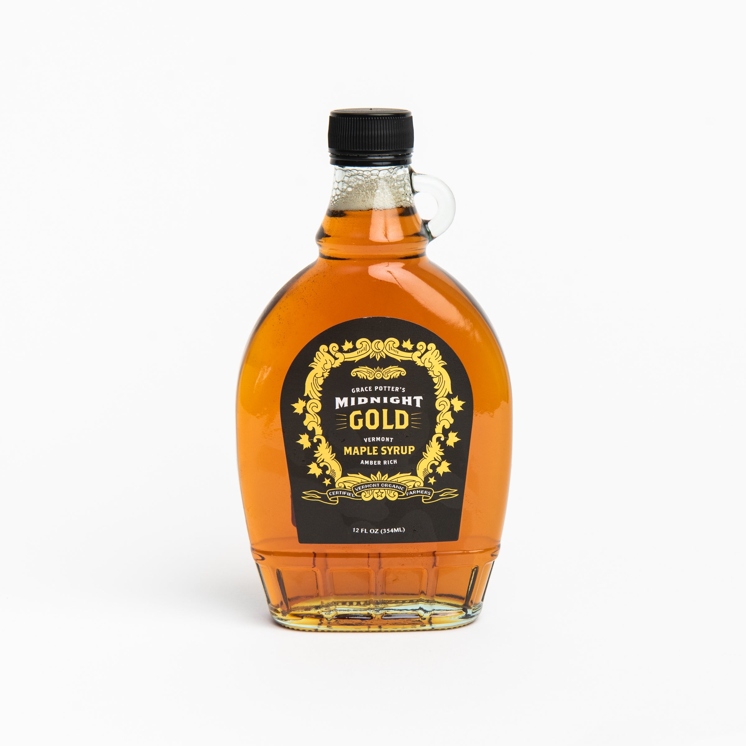 Grace Potter's Midnight Gold Maple Syrup on a white background at Addison West