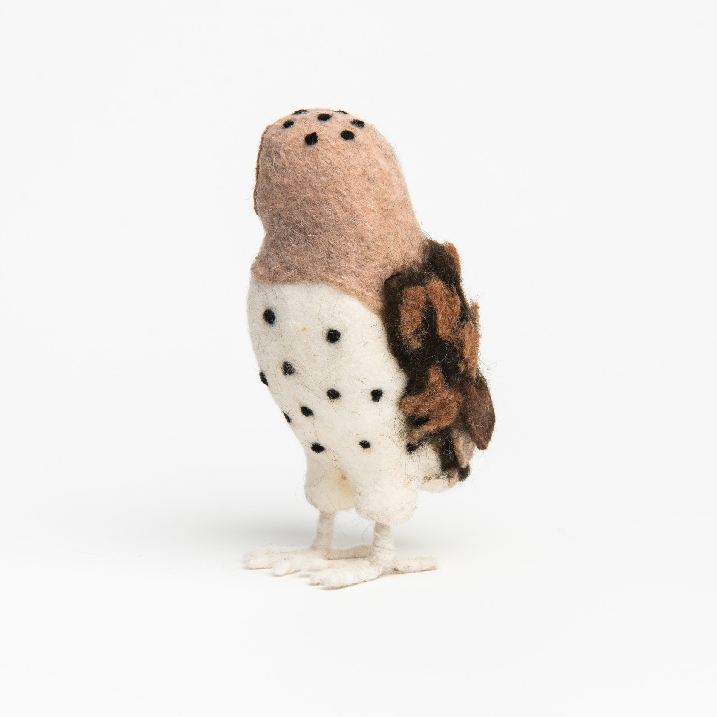 Side of Handmade Wool Felt Barn Owl on a white background at Addison West