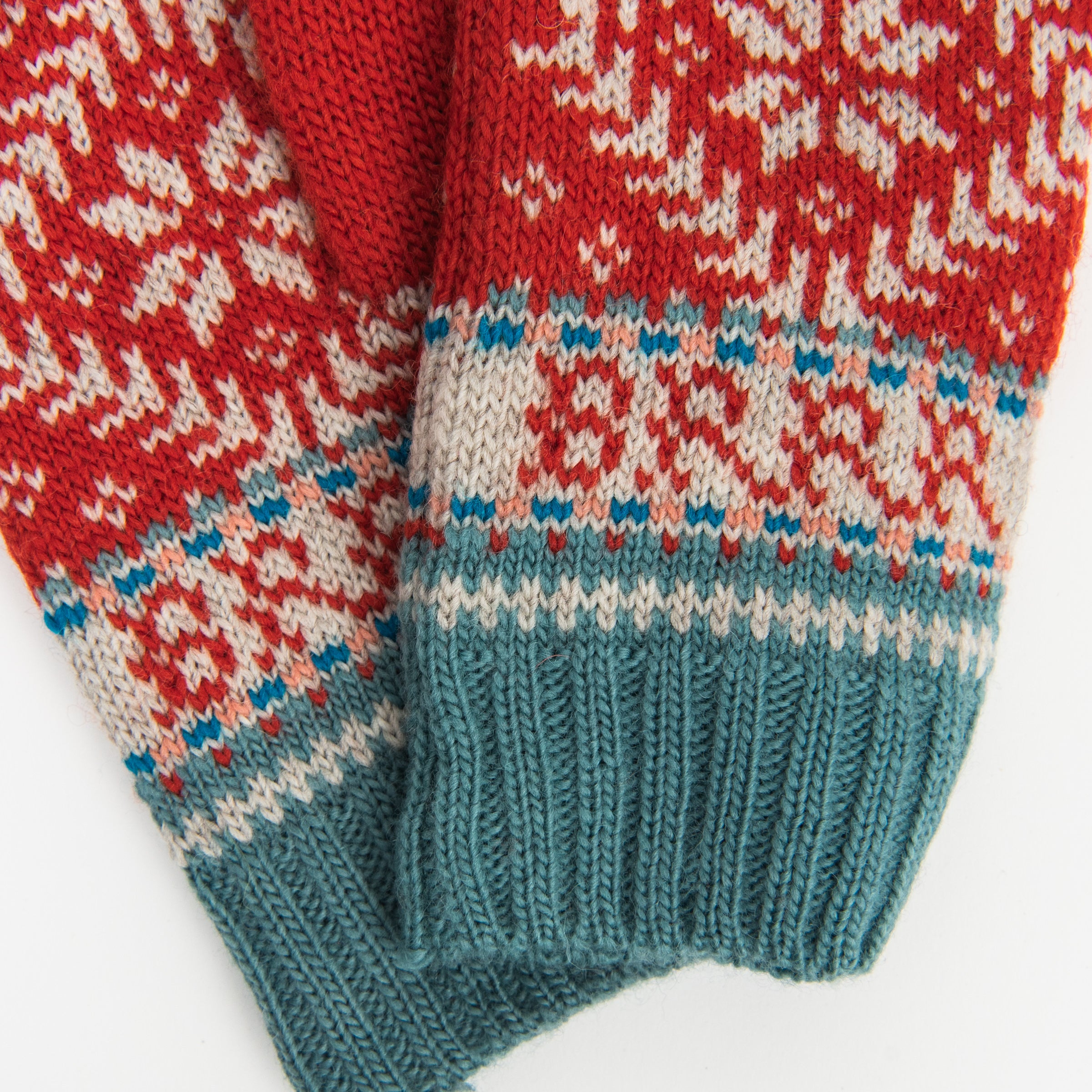 Novelty Nordic Mitten in Tomato on a white background at Addison West
