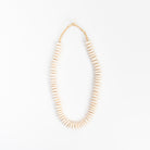 Saucer White Bone Beads on a white background at Addison West