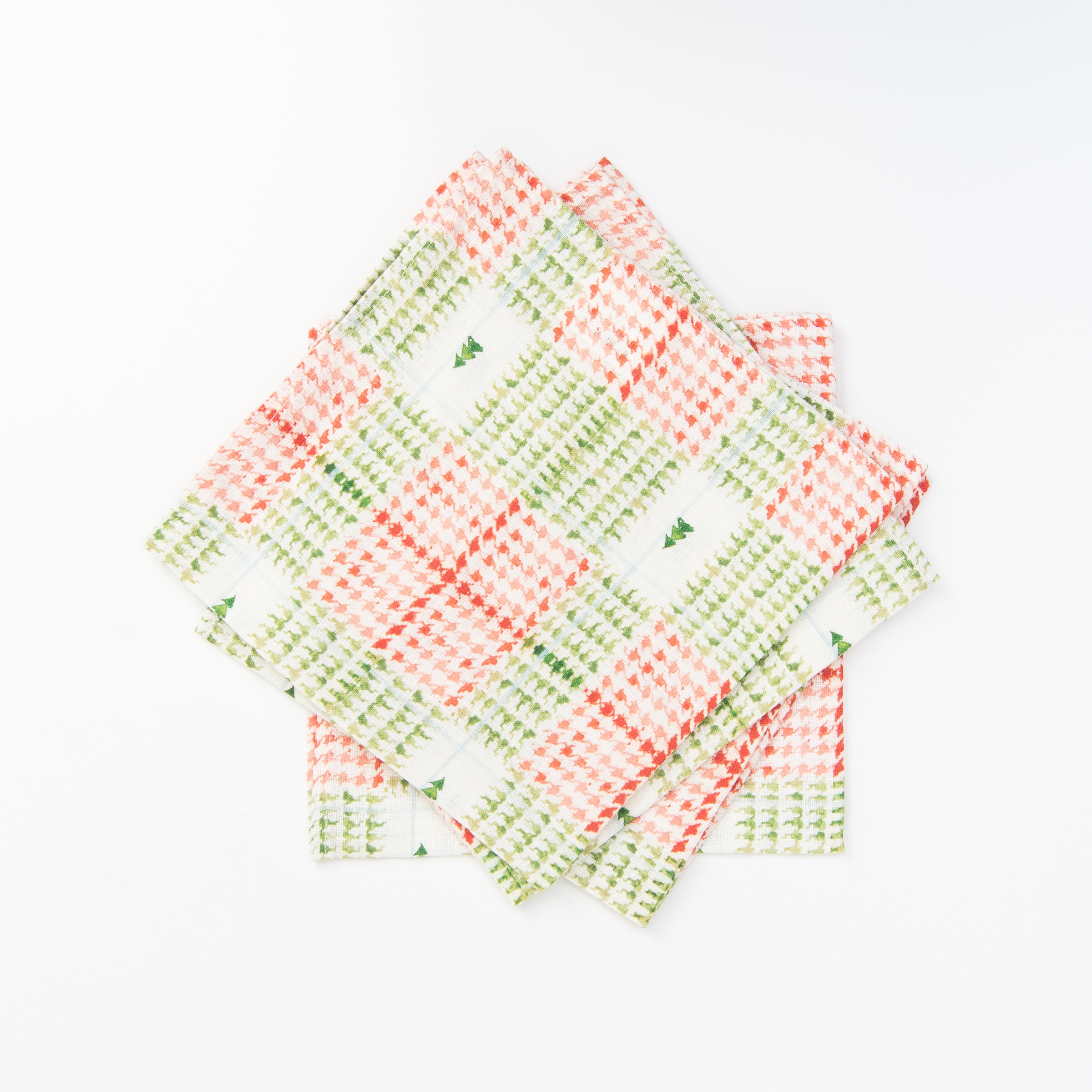 Linen Dinner Napkins in Xmas Plaid on a white table at Addison West