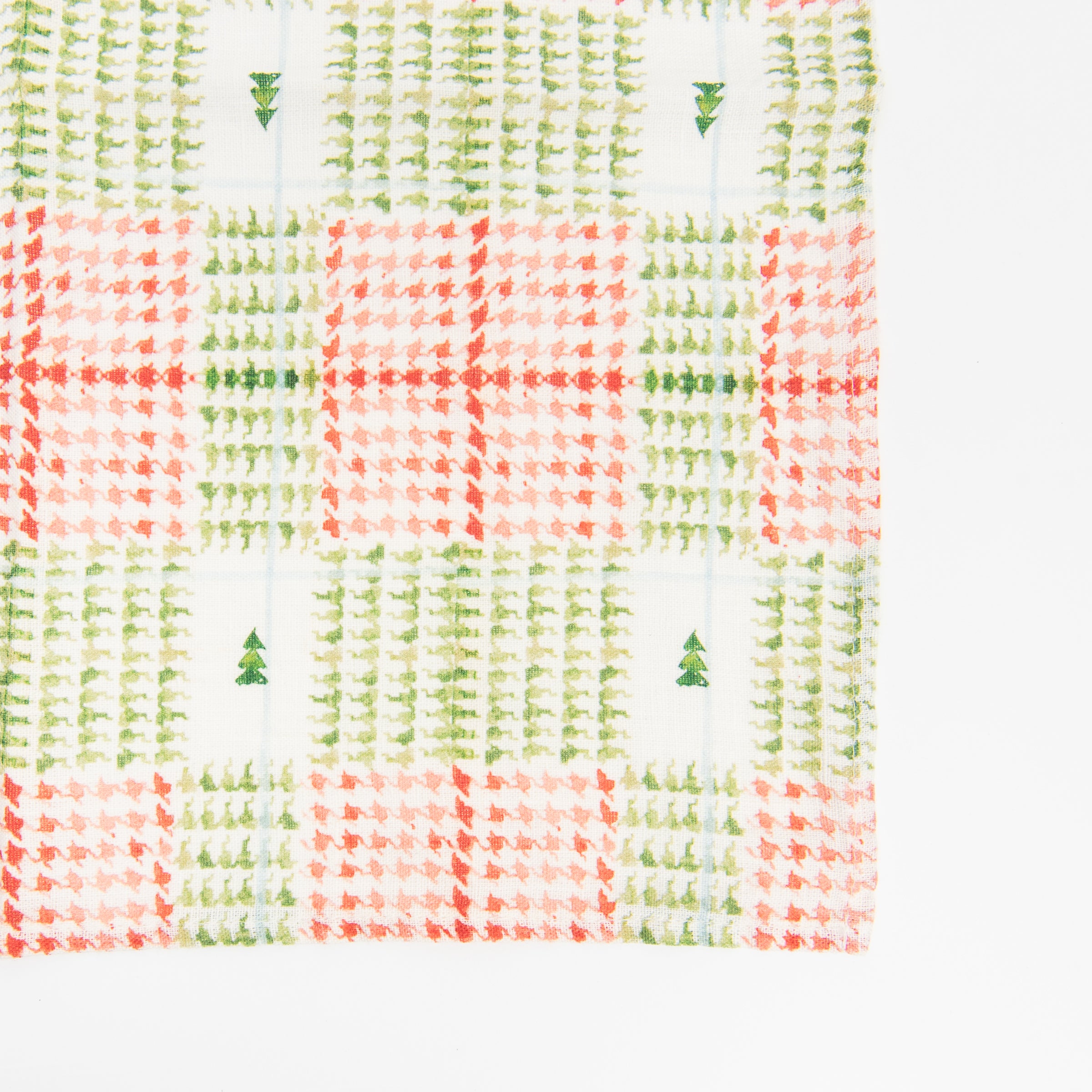Linen Dinner Napkins in Xmas Plaid on a white table at Addison West