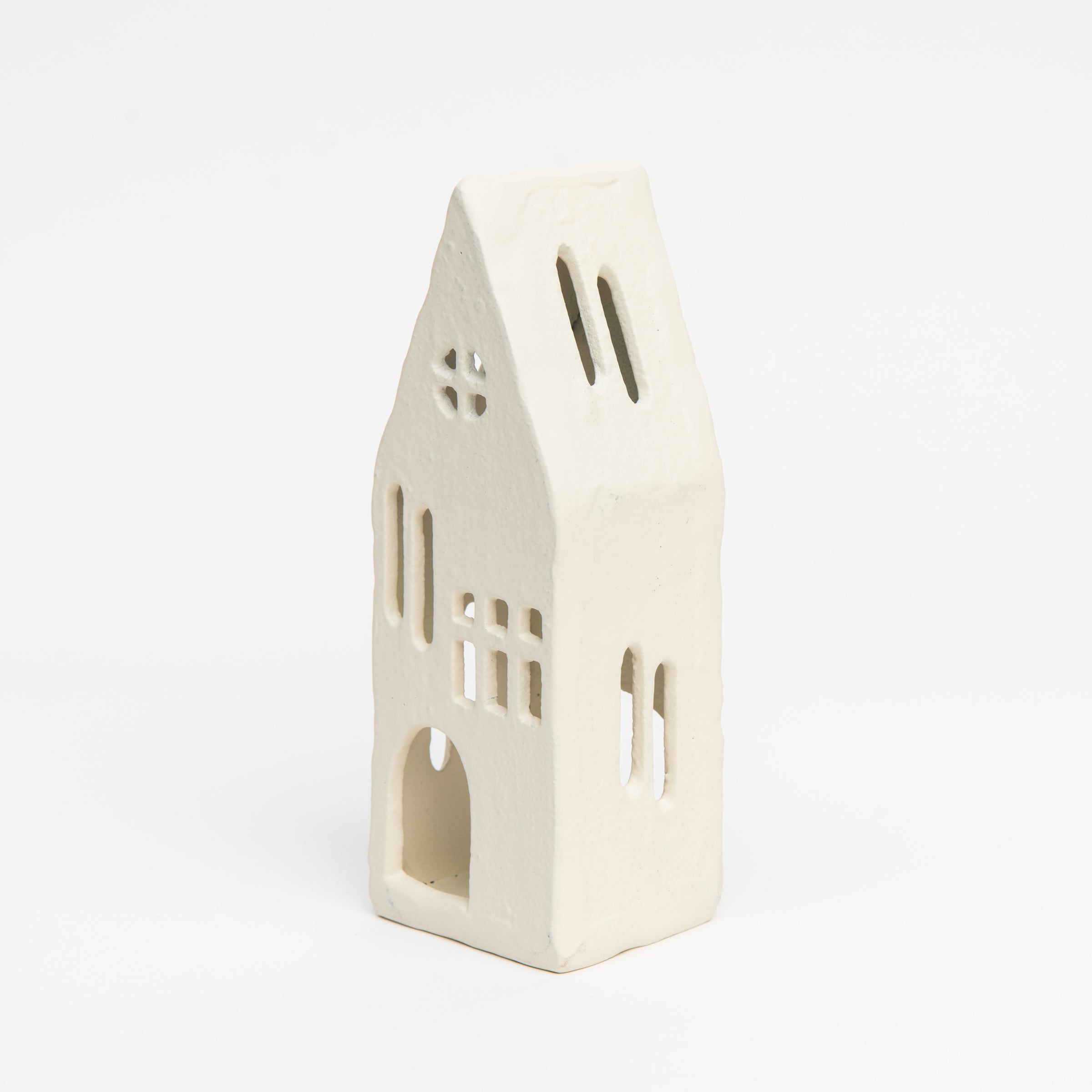Aspen Tealight House on a white background at Addison West