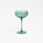 Cheers to You Glass in Green on a white background at Addison West