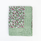 Block Print Tablecloth in Wakame Green on a white background at Addison West