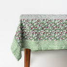 Block Print Tablecloth in Wakame Green on a white background at Addison West