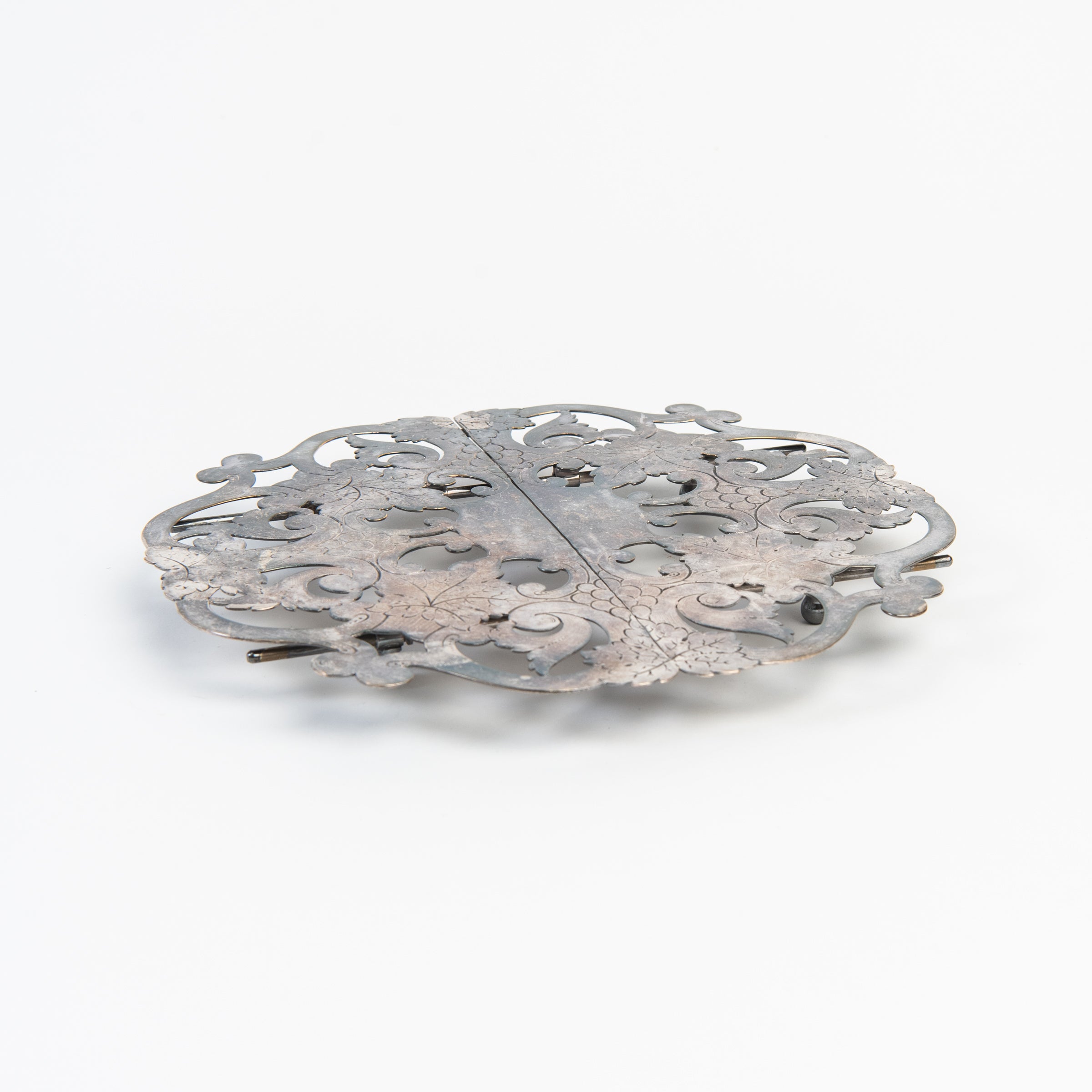 Vintage Silver Trivet on a white background at Addison West