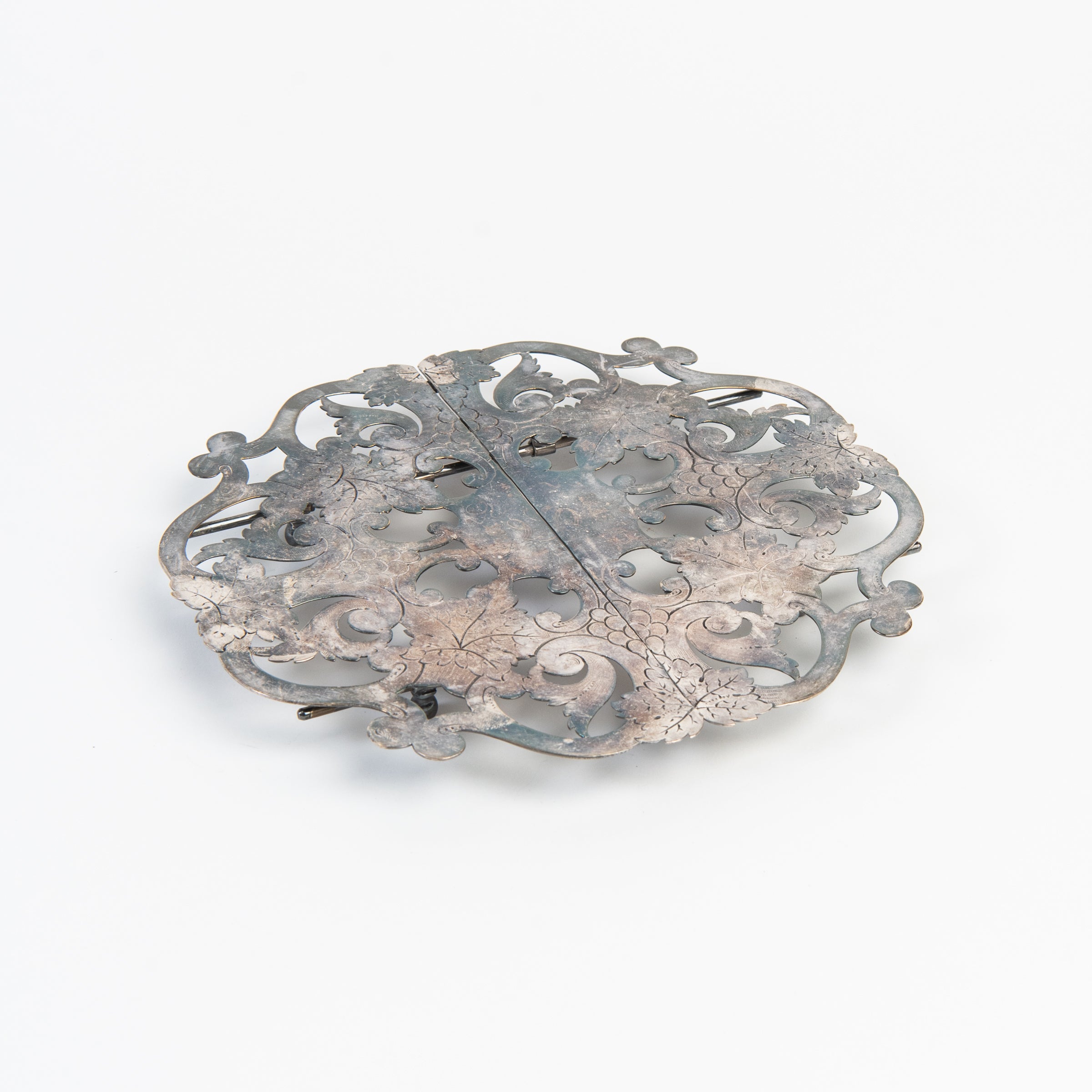 Vintage Silver Trivet on a white background at Addison West