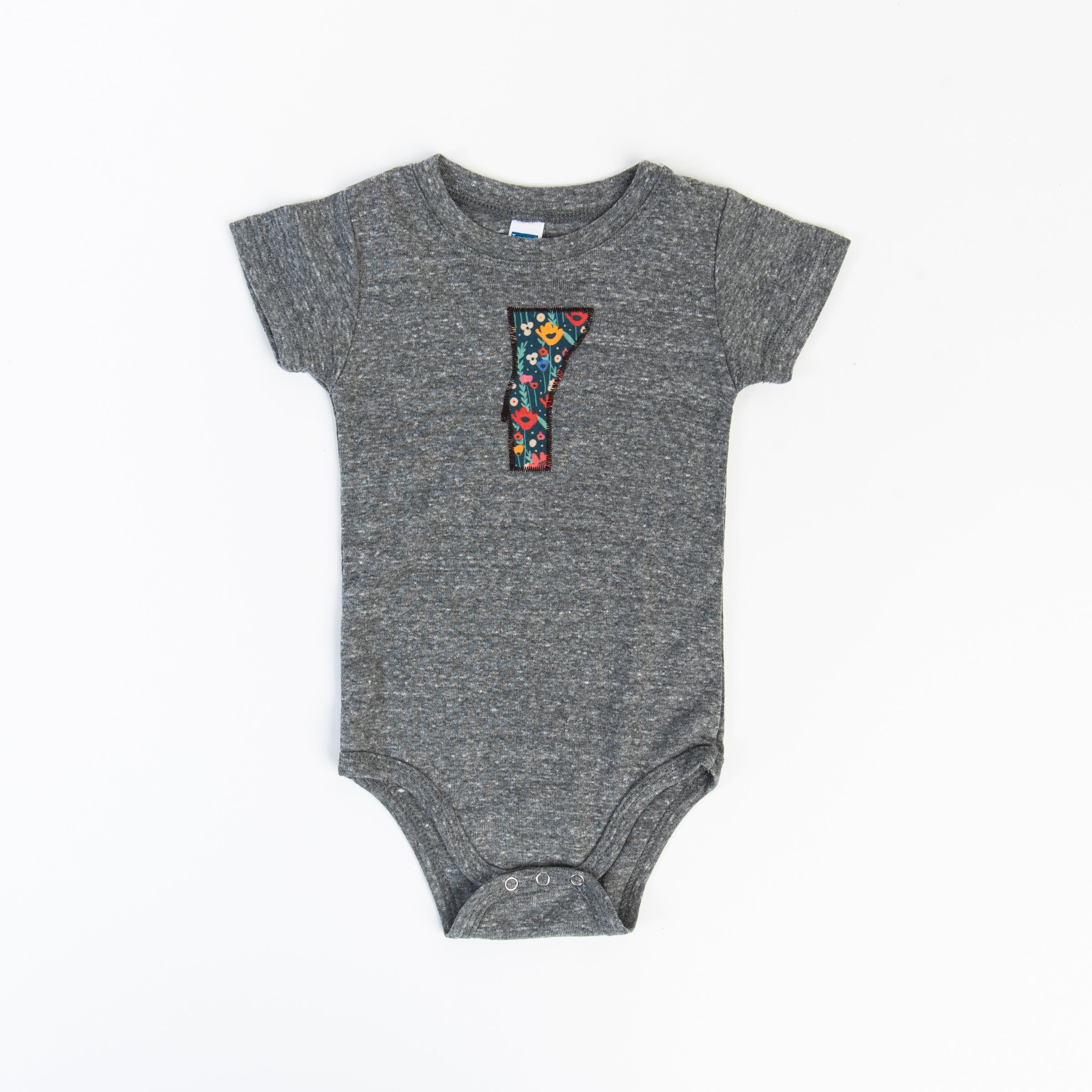 Vermont Baby Bodysuit - Wildflower on a white background at Addison West