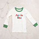 Apres Ski Organic Cotton Toddler PJs on a marble table at Addison West