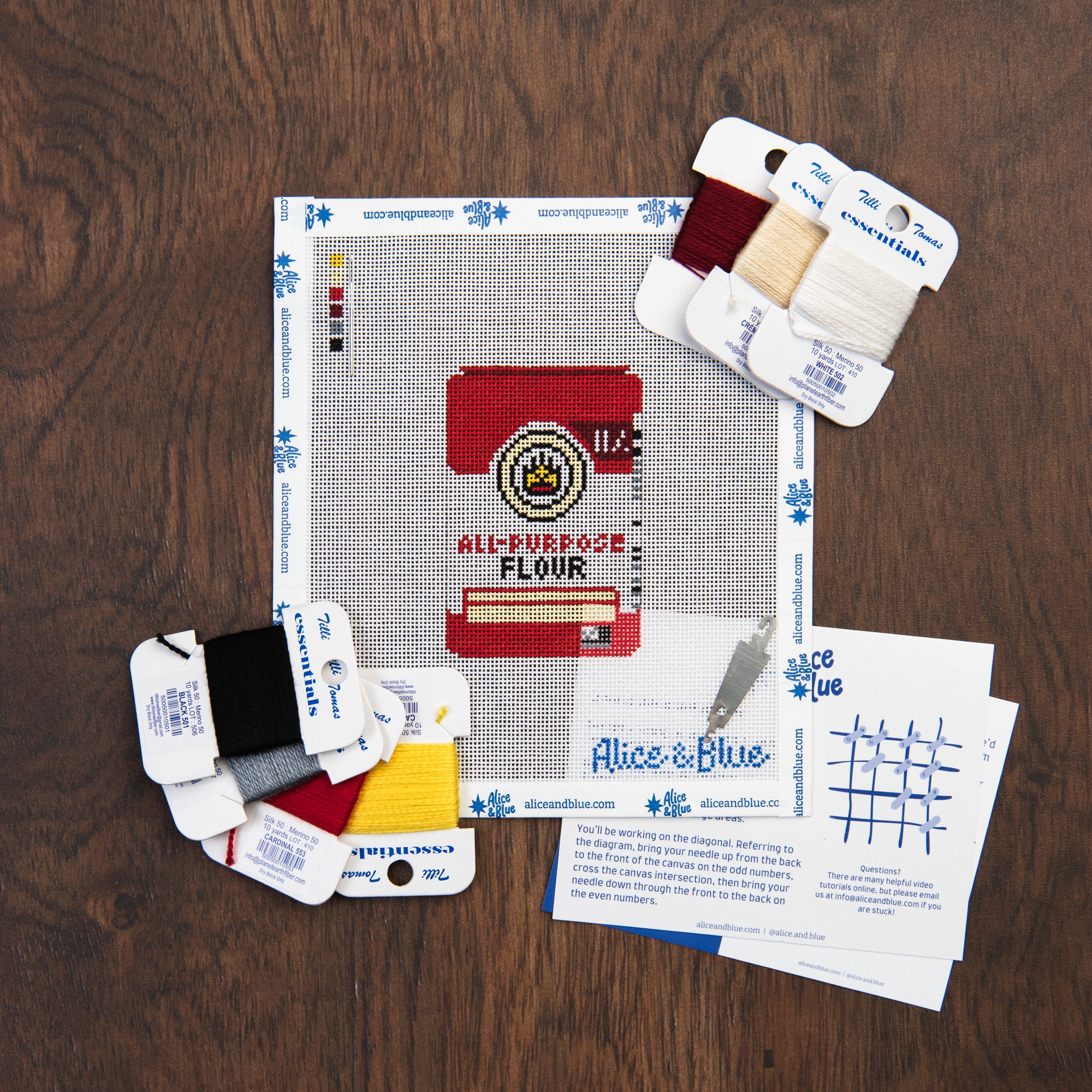 King Arthur Flour Needlepoint Kit on a wood table at Addison West