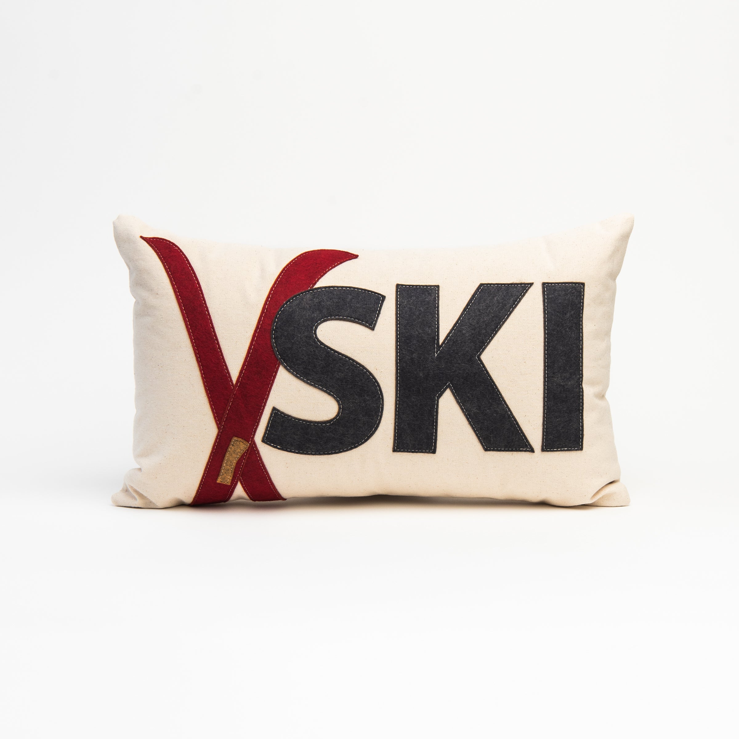 Red Crossed Ski Lumbar Pillow on a white background at Addison West