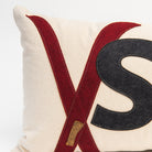 Close up of Red Crossed Ski Lumbar Pillow on a white background at Addison West
