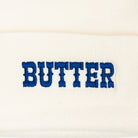 Butter Beanie on a white background at Addison West