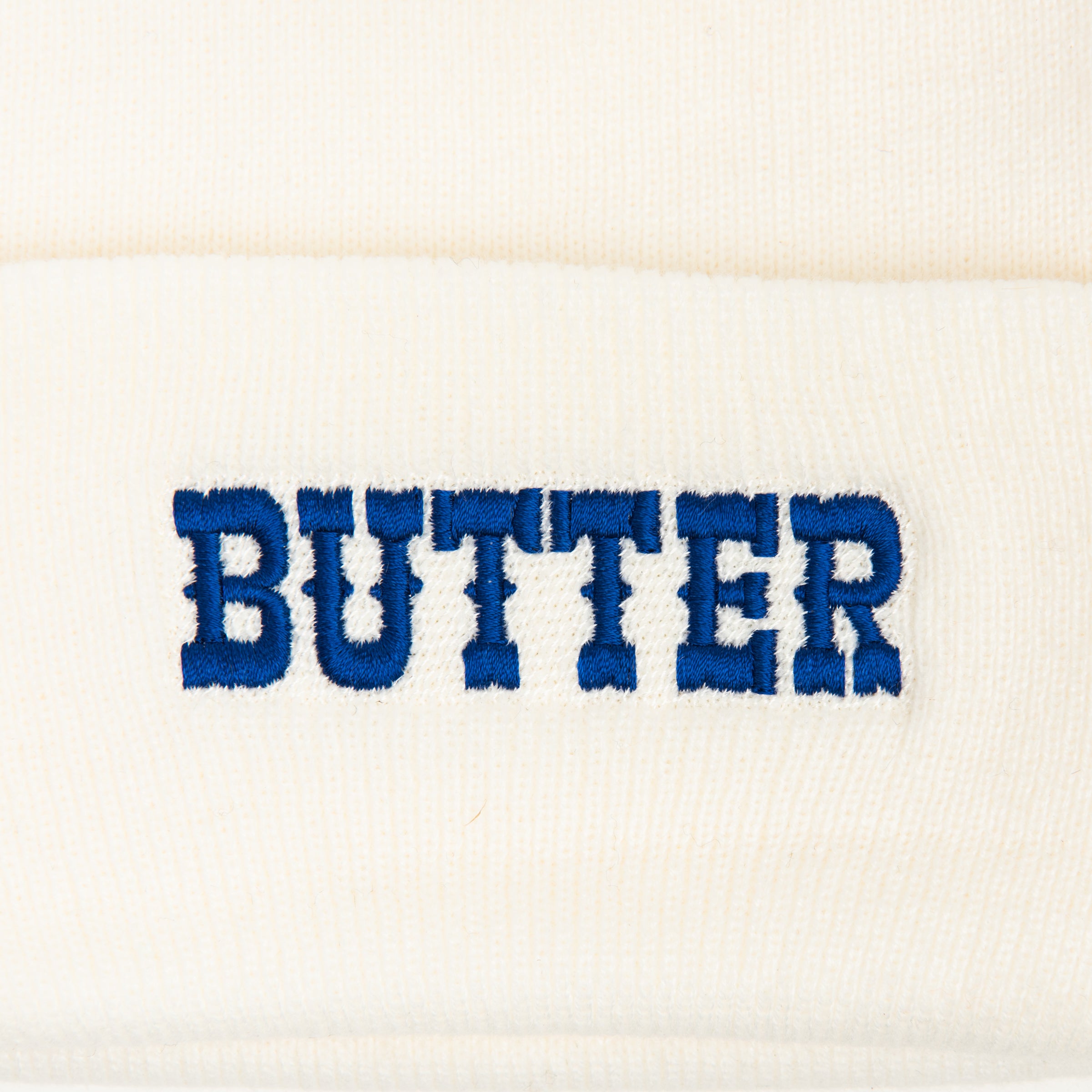 Butter Beanie on a white background at Addison West