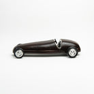 Leather Vintage Race Car on a white background at Addison West