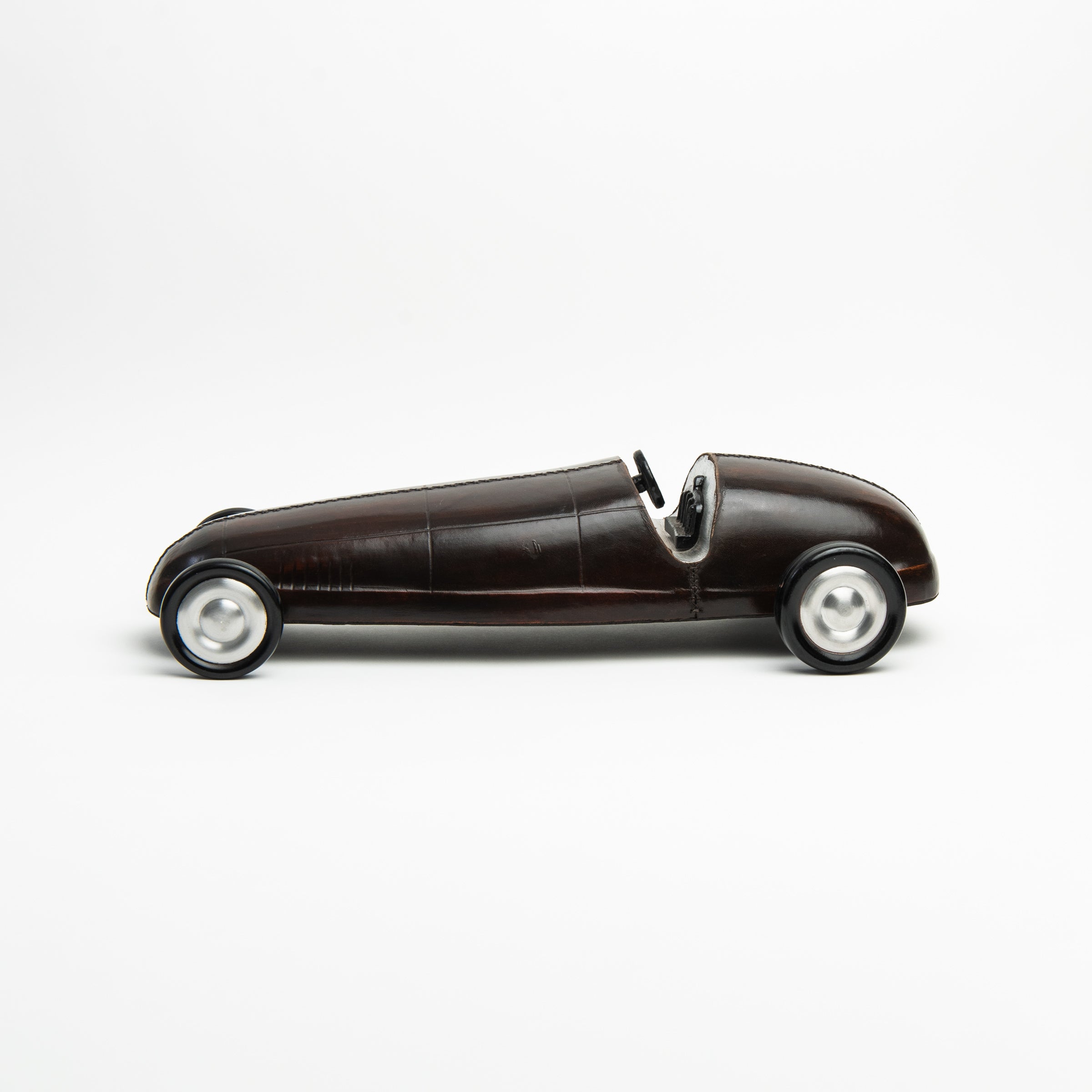 Leather Vintage Race Car on a white background at Addison West