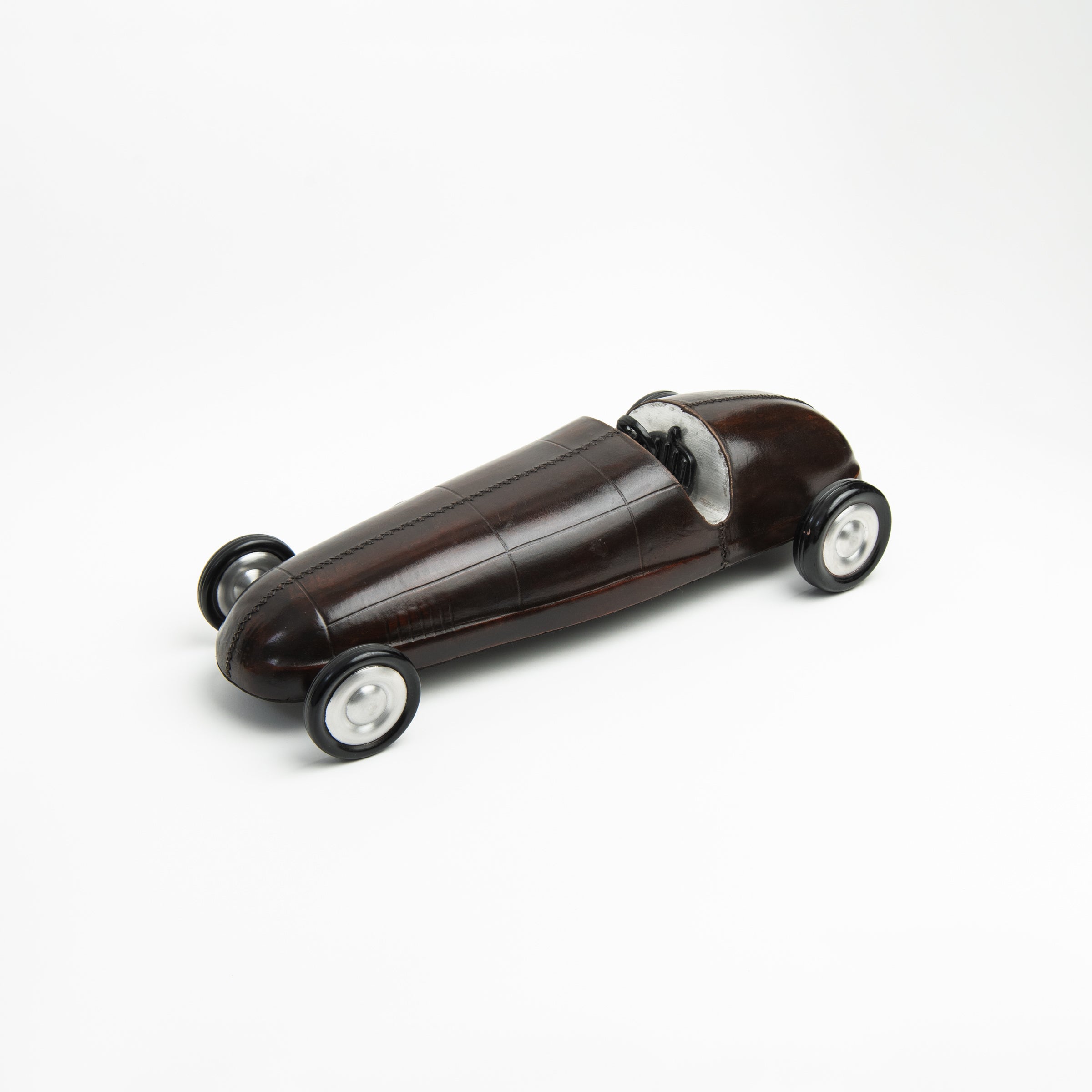 Leather Vintage Race Car on a white background at Addison West