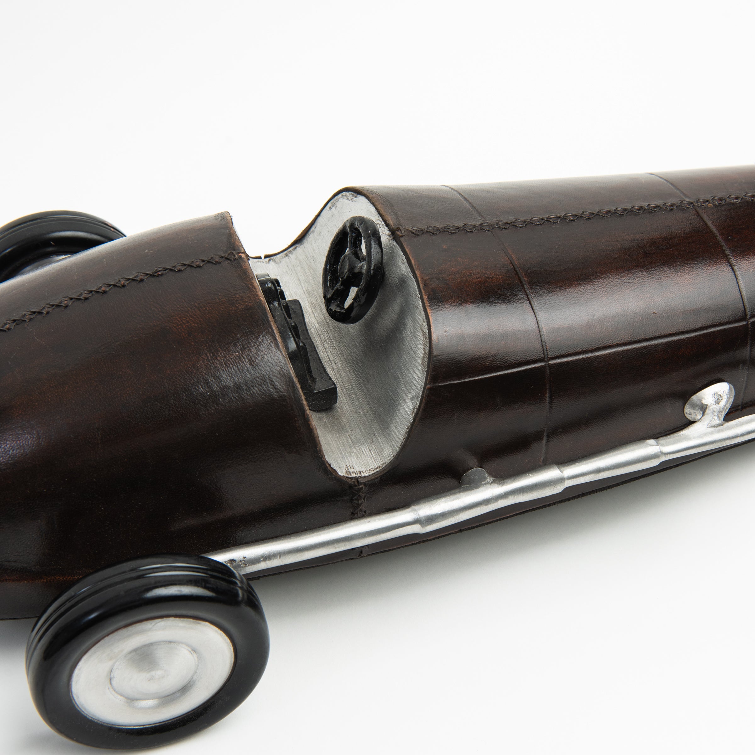 Leather Vintage Race Car on a white background at Addison West