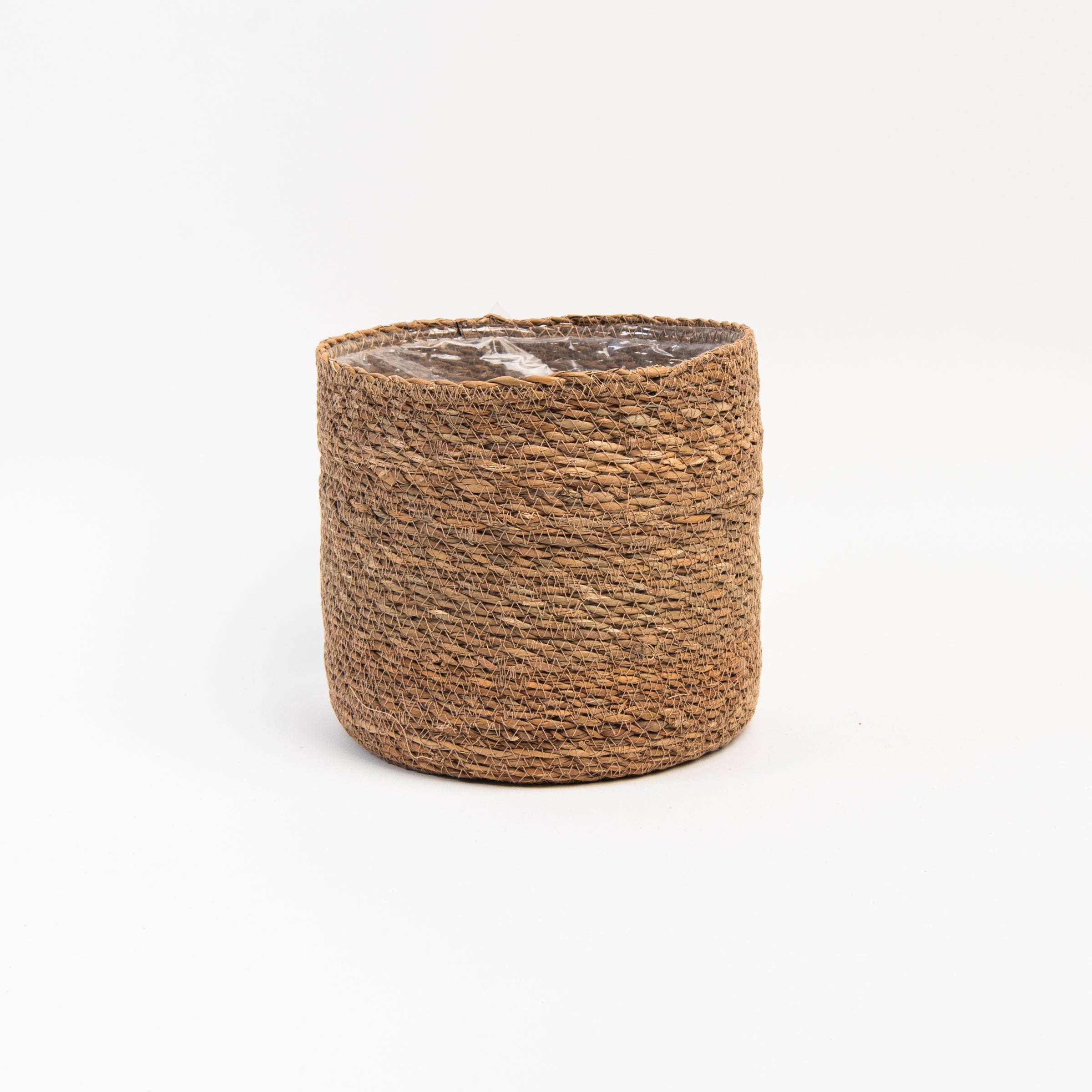 Hand-Woven Baskets with Plastic Lining on a white background at Addison West