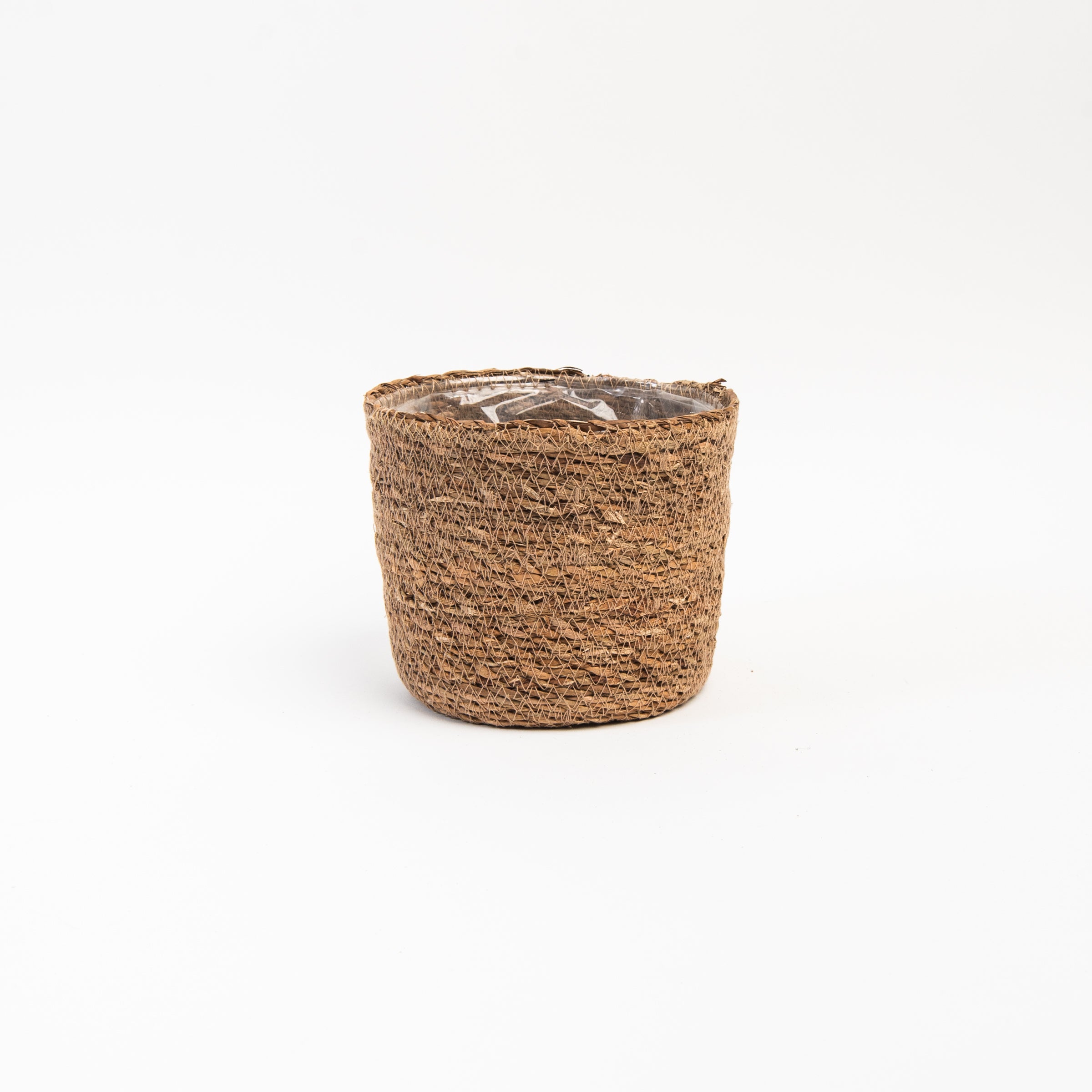 Hand-Woven Baskets with Plastic Lining on a white background at Addison West