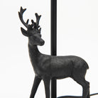 Close up of Bronze Deer Lamp on a white background at Addison West