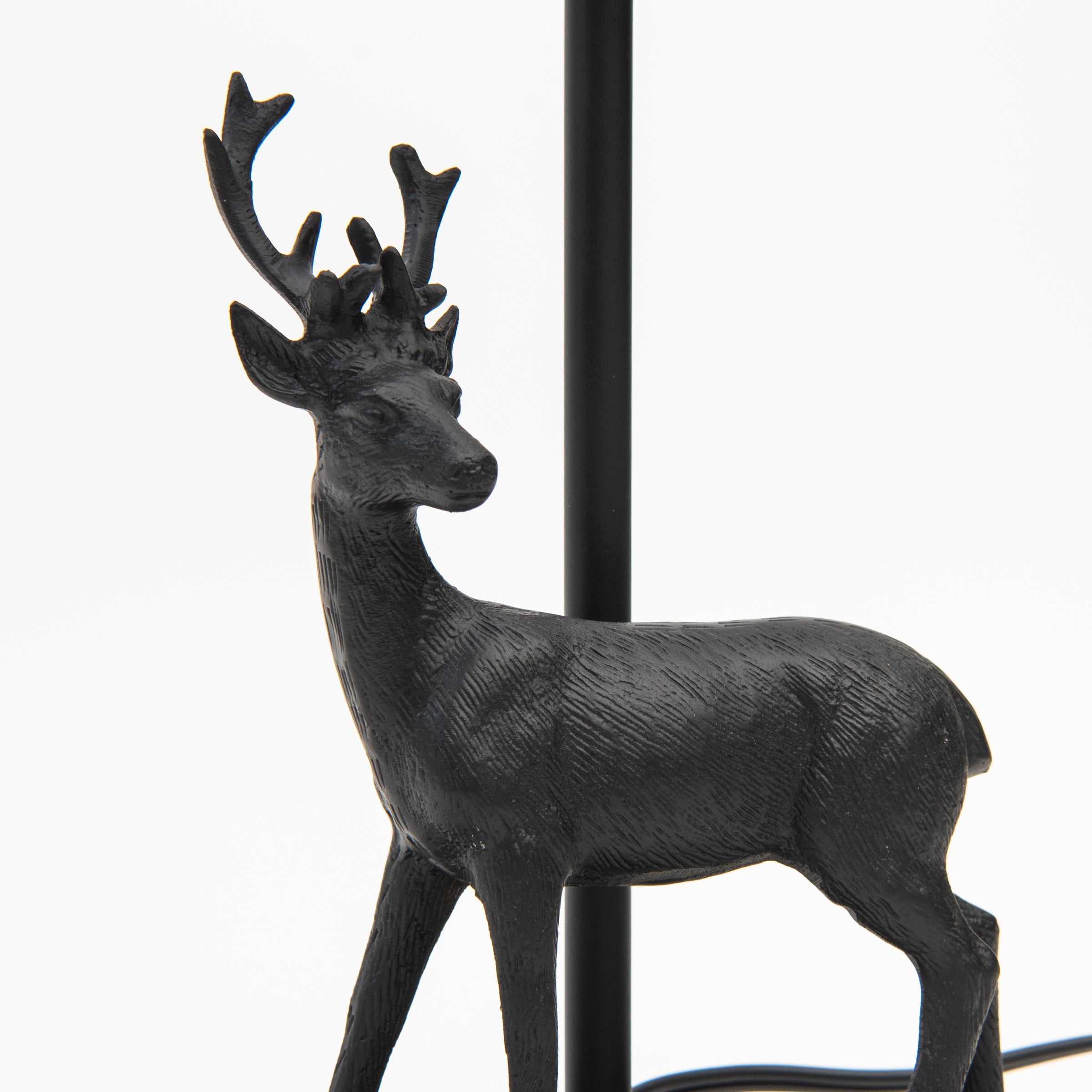 Close up of Bronze Deer Lamp on a white background at Addison West
